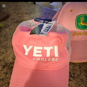 Yeti and John Deere hats. Both new- yeti still has tags.